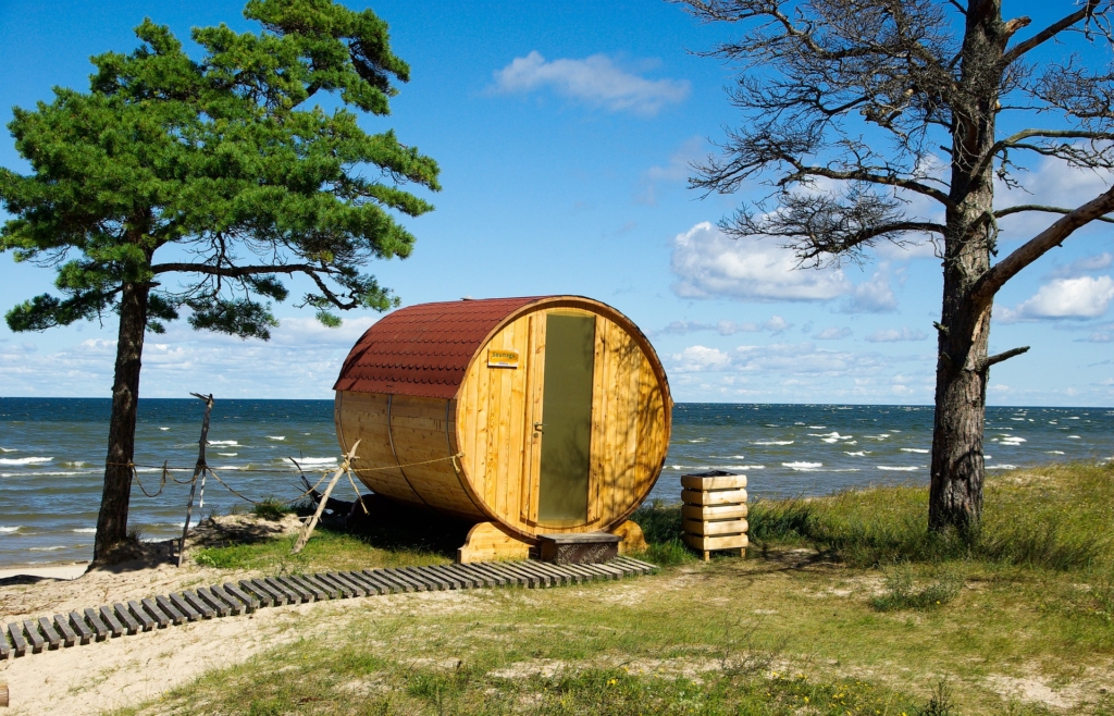 Outdoor round sauna on lake front