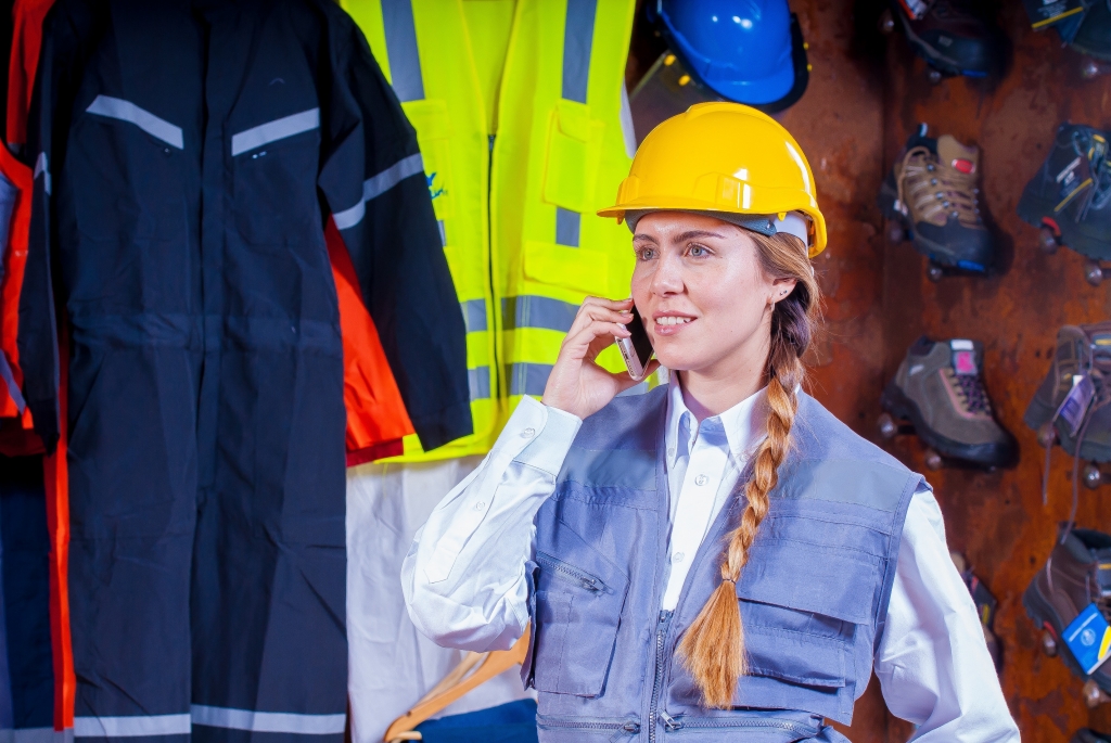 Woman in construction in construction protective clothing