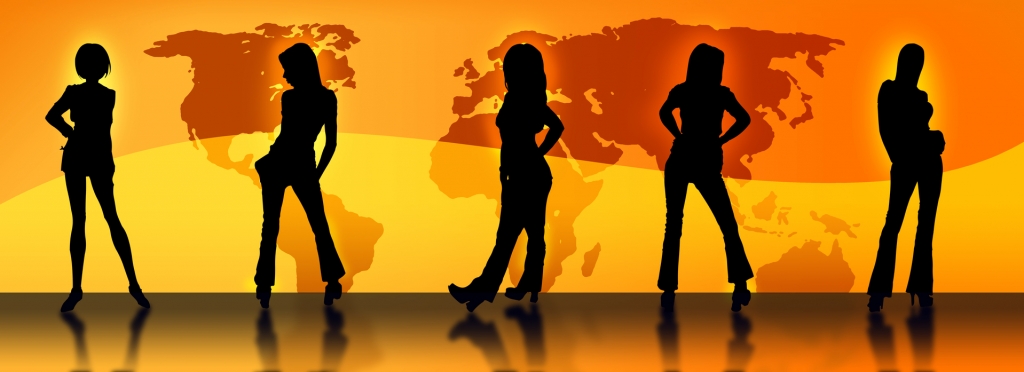 Various silhouettes of business women with map of the world behind