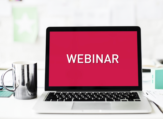 Laptop with red screen and the word Webinar on it