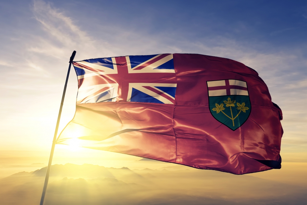 Ontario flag waving in the sunset