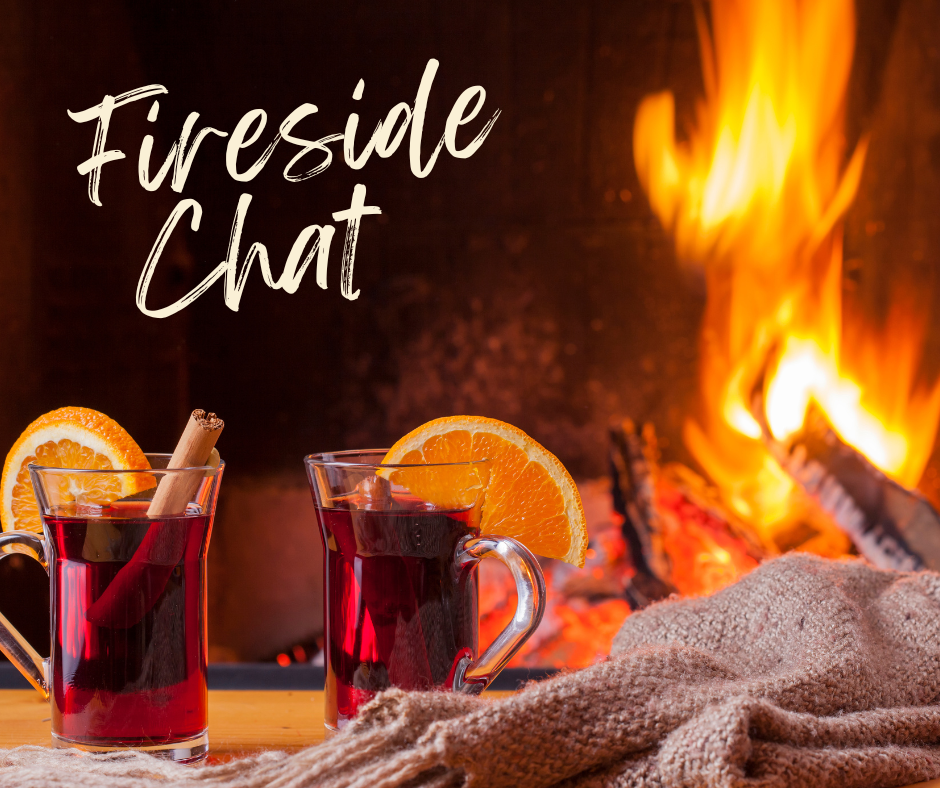 Two mugs sitting in front of a fireplace. The words Fireside Chat written on the image.