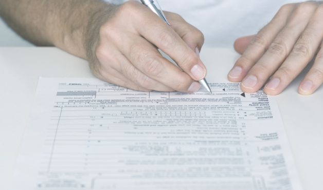 Person signing tax document
