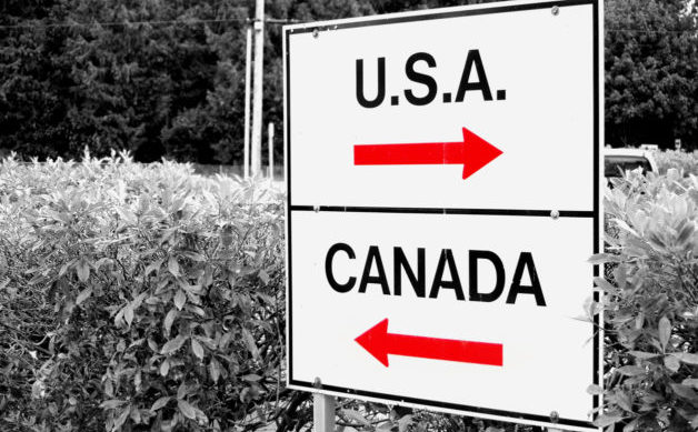 A shot of a sign at the US/Canadian border