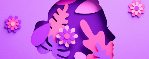 Photo of women's face covered in flowers. Image is a mixture of purple & pinks.