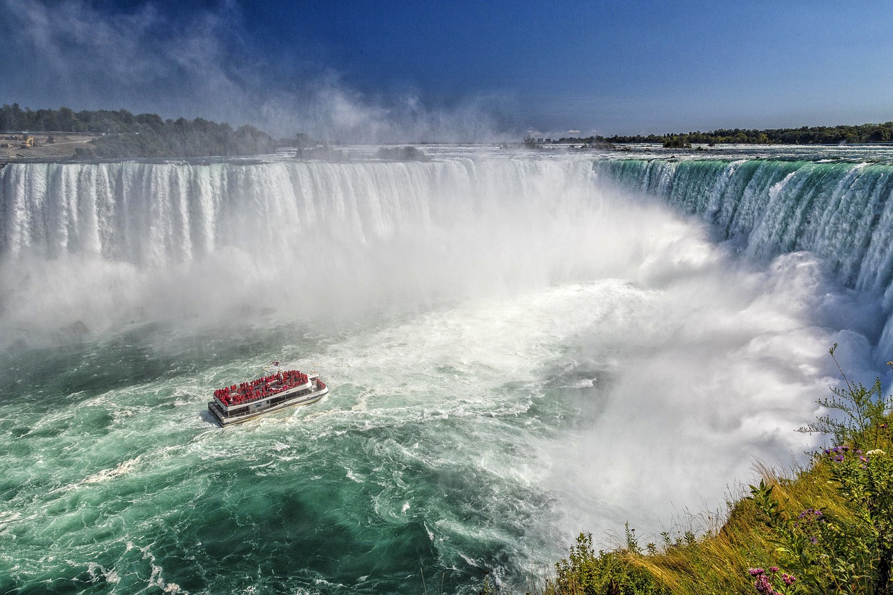 Picture of Niagara Falls with the Maid of the Mist Boat heading towards the Falls.