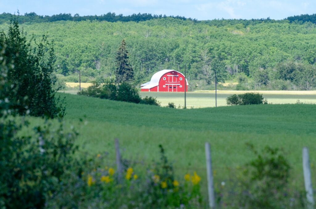Red barn on farm fields