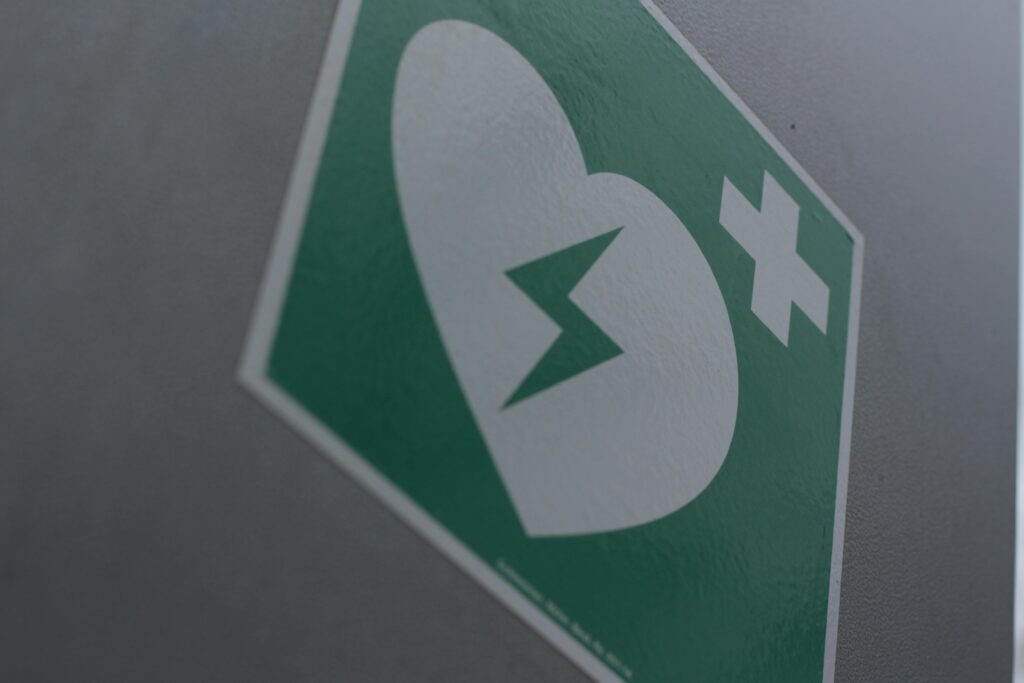 The universal AED sign, developed by the International Liaison Committee on Resuscitation and adopted as ISO 7010 E010