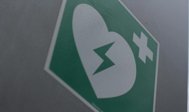 The universal AED sign, developed by the International Liaison Committee on Resuscitation and adopted as ISO 7010 E010