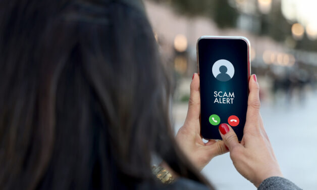 Scam incoming call alert screen on mobile phone.